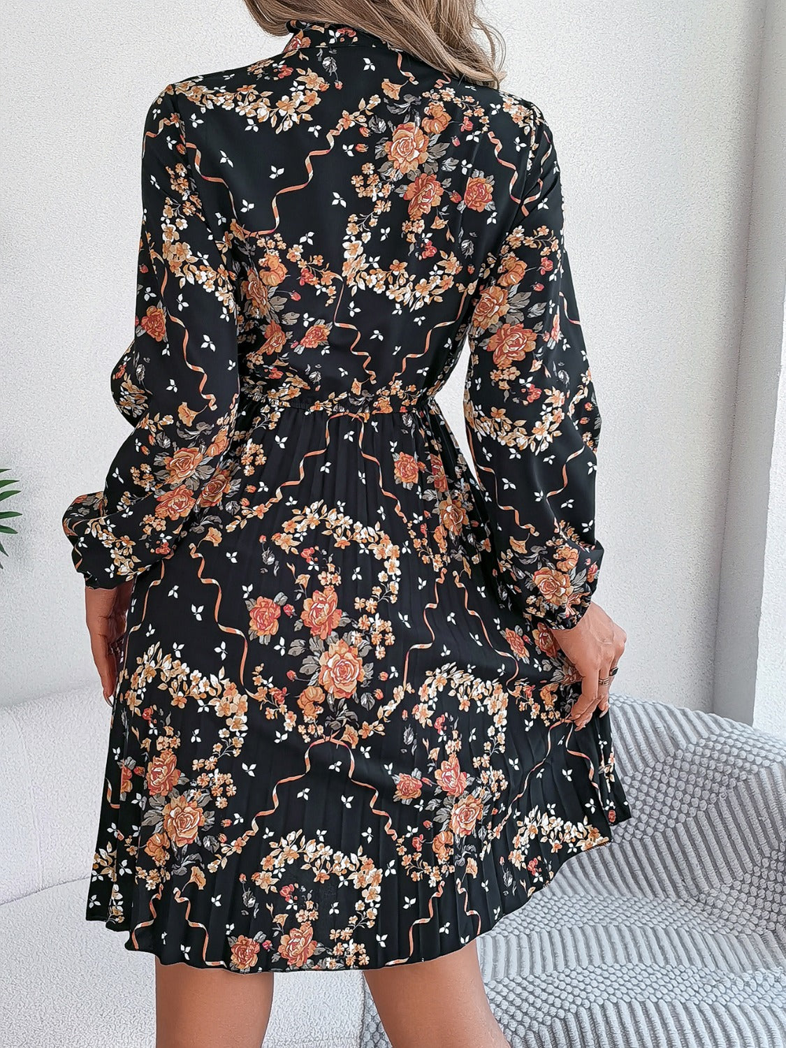 Pleated Floral Tie Neck Long Sleeve Dress