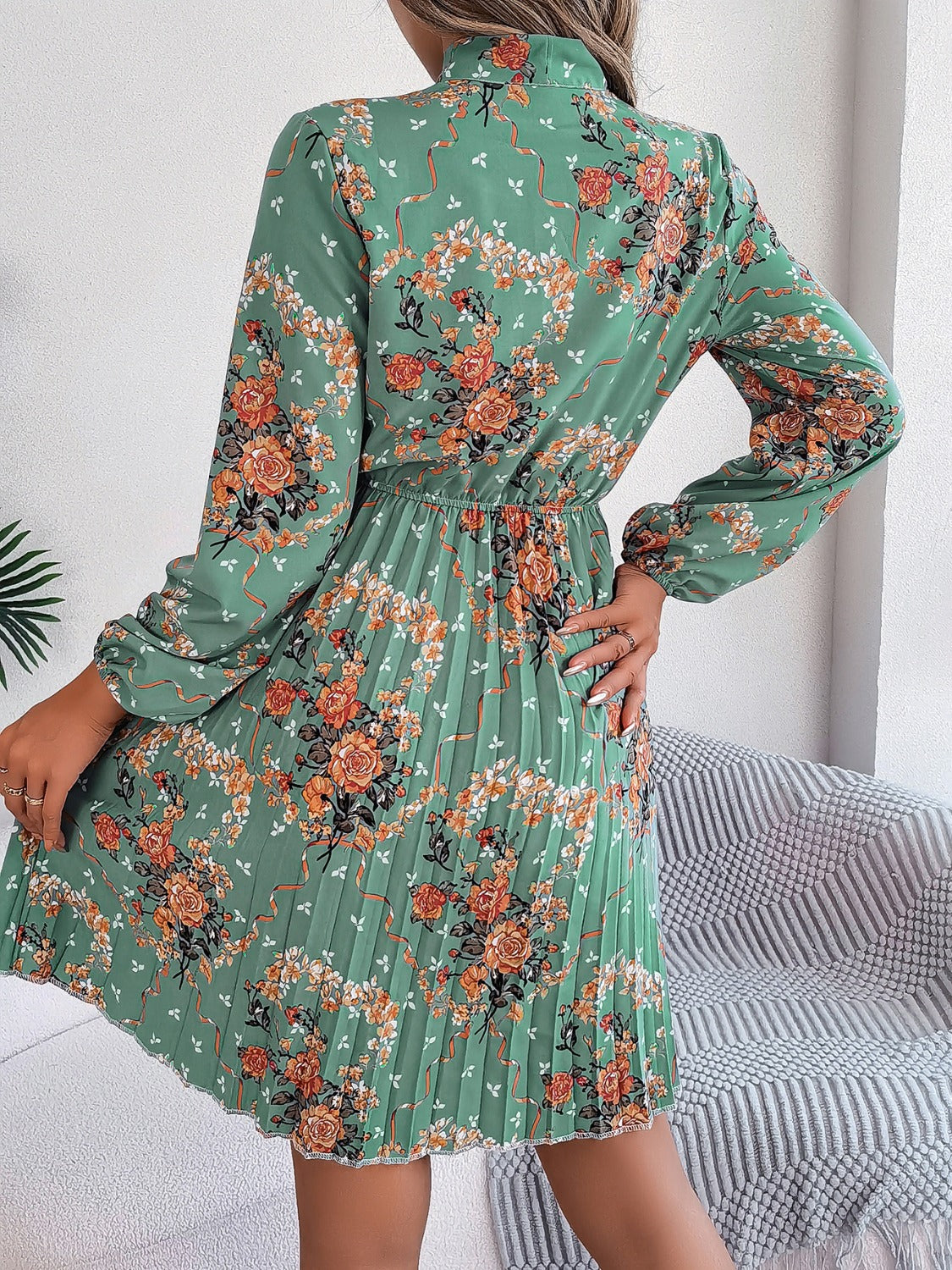 Pleated Floral Tie Neck Long Sleeve Dress