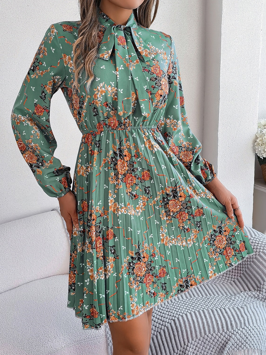 Pleated Floral Tie Neck Long Sleeve Dress
